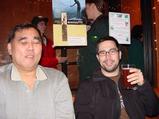 Tom enjoying a raspberry wheat beer while Bert is blinded by the flash.