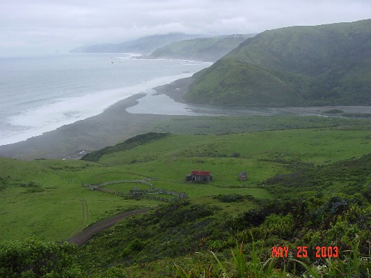 A view of the Mattole River running into the Pacific Ocean.